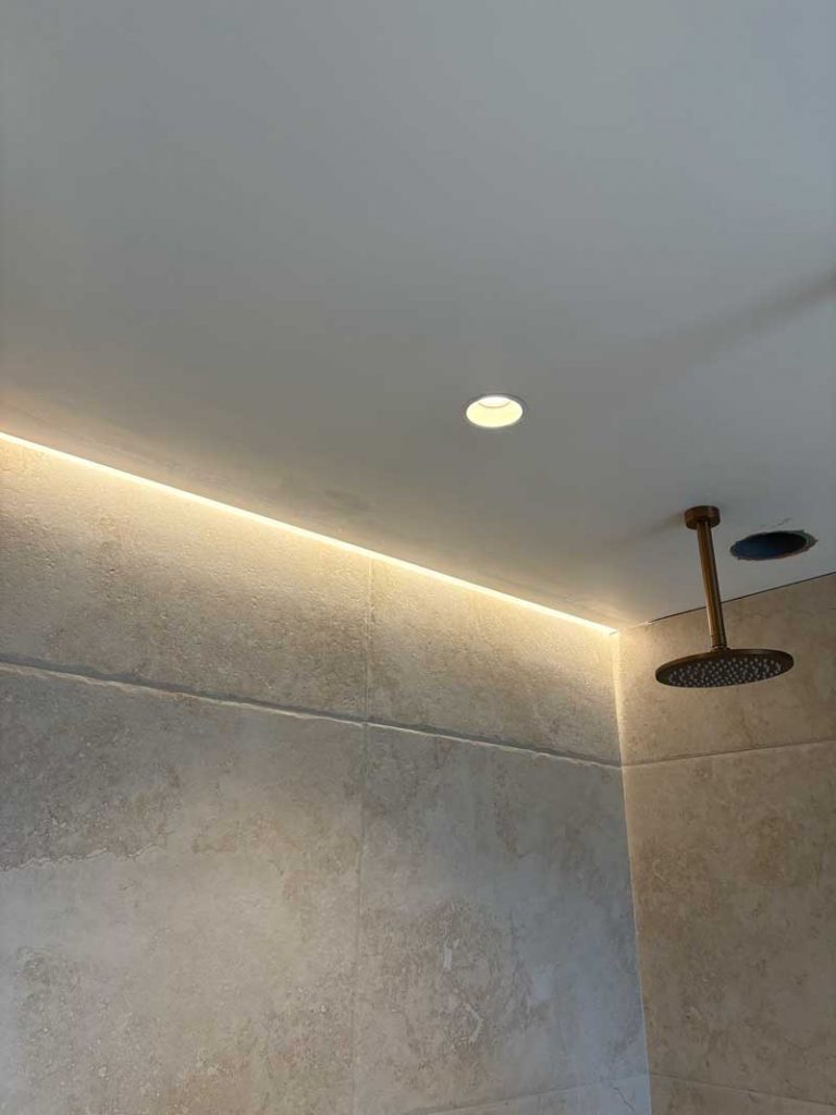 Recessed bathroom ceiling lights.